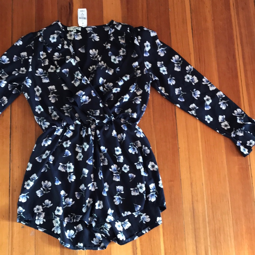 Romper with ruffled surplice neckline